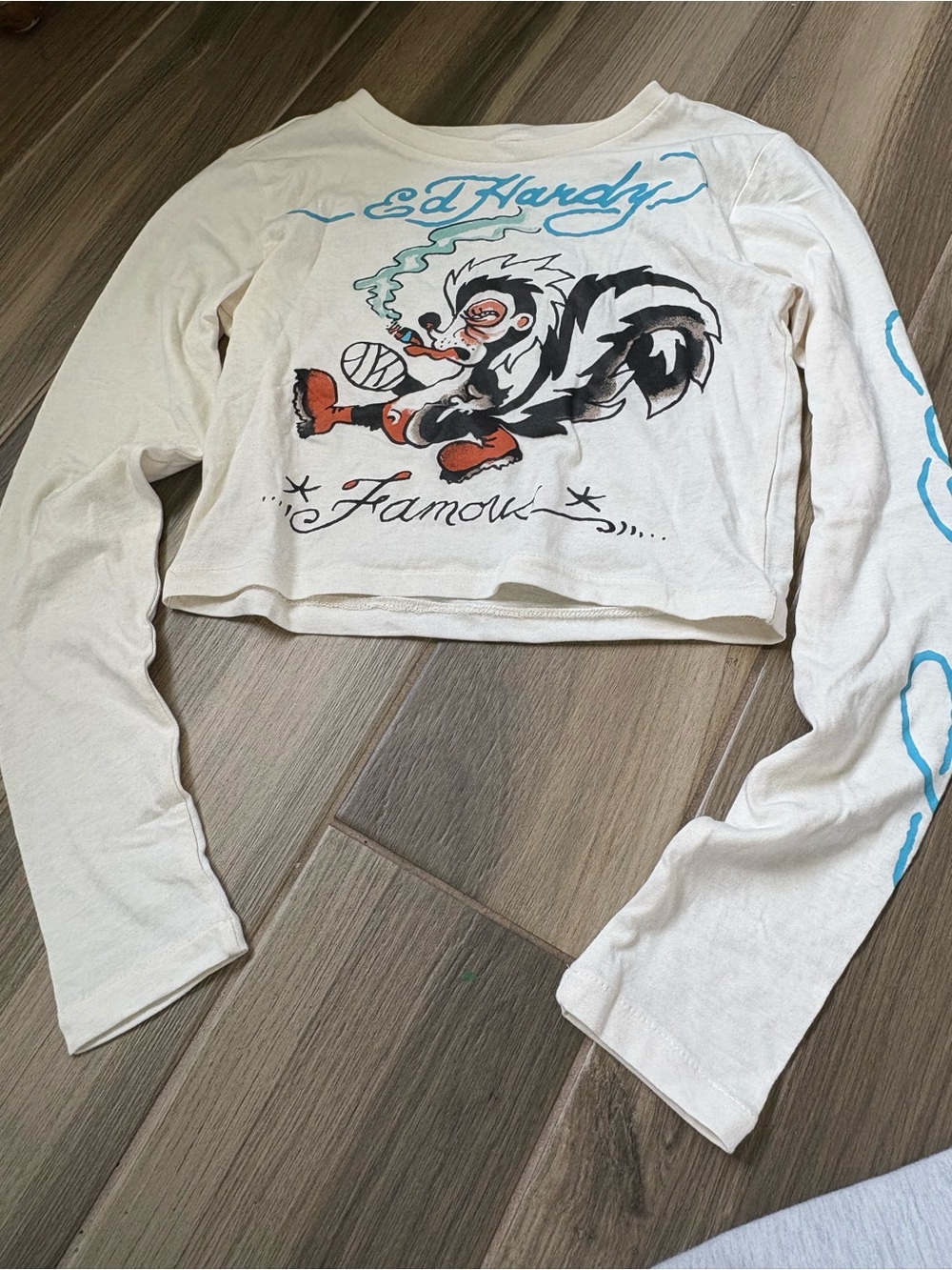Ed Hardy White Cropped Long Sleeve Tee with Graphic Skunk